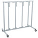 A metal rack with four metal bars on wheels.
