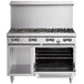 A large stainless steel Garland commercial gas range with standard oven and storage base.