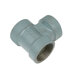 A grey pipe fitting with a threaded end and a nut.