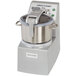 A Robot Coupe commercial food processor with a silver lid and handle.