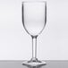 A customizable clear plastic wine glass on a table.