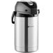 A stainless steel Bunn coffee airpot with a black lid.