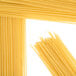 A close up of a pile of Regal spaghetti noodles on a white background.
