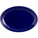A cobalt blue oval China platter with white stripes.