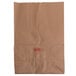 A brown paper bag with a red logo.