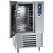 A large stainless steel Alto-Shaam commercial blast chiller with a door open.