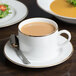 A 10 Strawberry Street gold line porcelain can cup of coffee on a saucer with soup