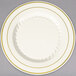 A Fineline Silver Splendor plastic plate in bone/ivory with gold bands on the rim.