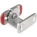 A stainless steel Metro travel latch with red metal handles.