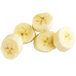 A group of sliced bananas on a white background.