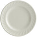 A Tuxton Meridian ivory china plate with a swirl rim.