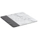 A white and black marble and slate square serving board.