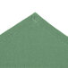 A folded seafoam green fabric chef bandana with stitched edges.