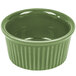 A green fluted ceramic CAC China ramekin.