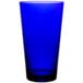 A close-up of a Libbey cobalt blue cooler glass.