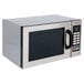 A silver Panasonic stainless steel commercial microwave with a black digital display and door.