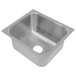 A stainless steel Advance Tabco undermount sink bowl with a square hole.
