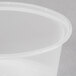 A close up of a Pactiv Newspring clear plastic oval souffle container.