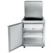 A white Traulsen refrigerated sandwich prep table with a left hinged door open.