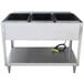 A stainless steel Vollrath electric hot food table with three pans.