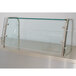 A glass display case with a metal frame and glass shelves on a counter.