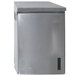 A stainless steel rectangular wall mounted cabinet with a square door.