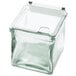 A clear square glass container with a Cal-Mil notched plastic lid on it.