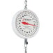 A white Cardinal Detecto hanging scale with double dial and chains.