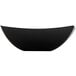 A black Fineline Wavetrends plastic serving bowl.