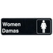 A black rectangular Tablecraft sign with white text that says "Women Damas"