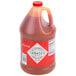 A 1 gallon jug of TABASCO® Original Hot Sauce.