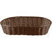 A Tablecraft brown rattan oblong basket with handles.