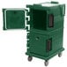 A green plastic Cambro Ultra Camcart food pan carrier with a door open.