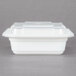 A white Pactiv rectangular plastic container with a lid.