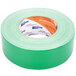 A roll of green Shurtape duct tape with white and orange text on it.