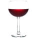 A Libbey Citation wine glass filled with red wine.