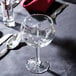 A Libbey Citation wine glass on a table with silverware.