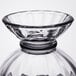 A close-up of a Libbey clear glass bowl with a black rim.