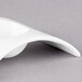 A white rectangular porcelain bowl with a wavy edge.