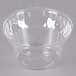 A clear plastic WNA Comet Classic Sundae Cup on a gray background.