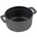 An American Metalcraft pre-seasoned black cast iron pot with two handles and a cover.