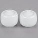 A 10 Strawberry Street Taverno white porcelain salt and pepper set with two shakers.