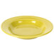 A yellow bowl with a white rim on a white background.