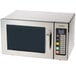A Panasonic stainless steel commercial microwave with a black door.