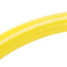 A close up of a yellow T&S Safe-T-Link gas appliance connector hose.