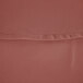 A close up of a mauve polyester cloth table cover with a hemmed edge.