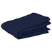 A stack of folded navy blue Intedge round table covers.