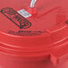 A red plastic Chef Master salad spinner container with a handle.