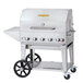 A silver Crown Verity natural gas barbecue grill with wheels.