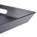 A close-up of a black rectangular GET room service tray with a handle.